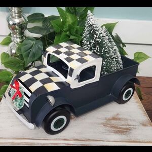 Checkered Black and White Decorative Truck with Trees